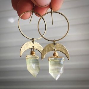 Hammered brass crescent moon earrings with gemstone.